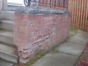 To build a new or repair a small garden wall