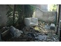 Cleaning and re-painting rear outside walls