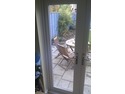 Fit replacement double glazed unit in with cat flap 