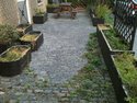 Repaint 15 outside plant boxes with wood stain