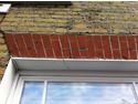 Repointing, brick repair and window sill repair
