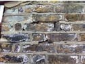 Repointing, brick repair and window sill repair