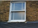Repointing, brick repair and window sill repair