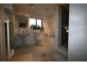 Re-fit large bathroom in bungalow