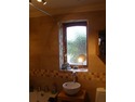 Tiler in Buckley
