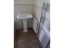 Tiler in Buckley