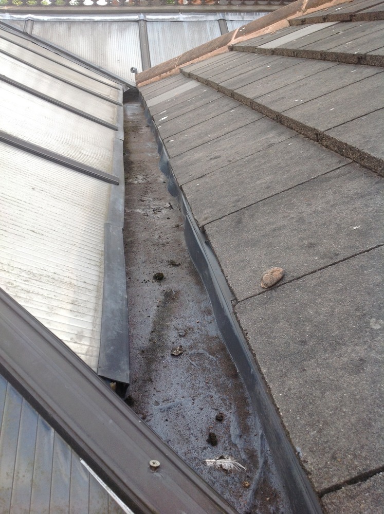Box guttering leaking into conservatory Roofing job in Birmingham