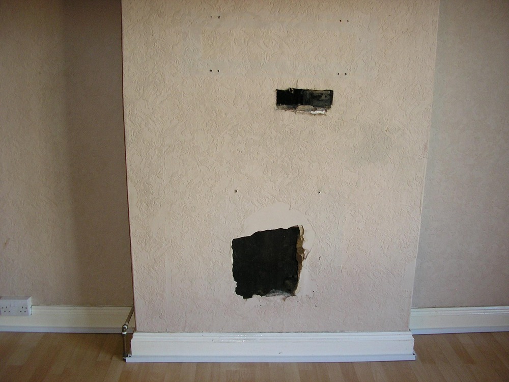 big holes in old fireplace needs filling & covering Chimneys
