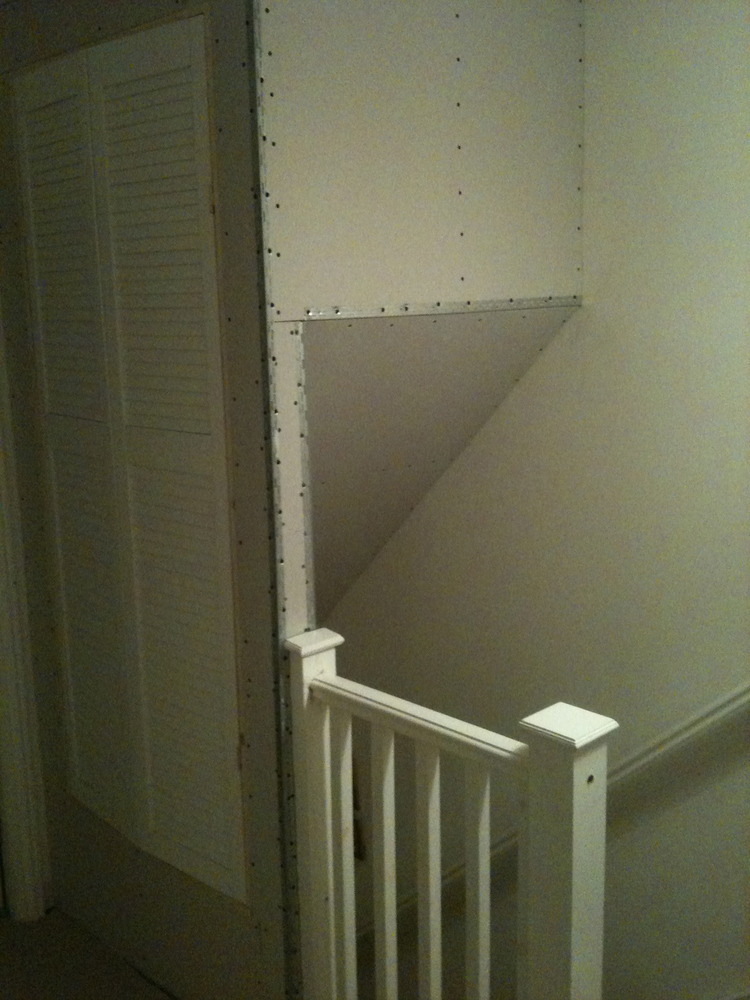 Taping and skim coat to new cupboard above stairs Plastering job in