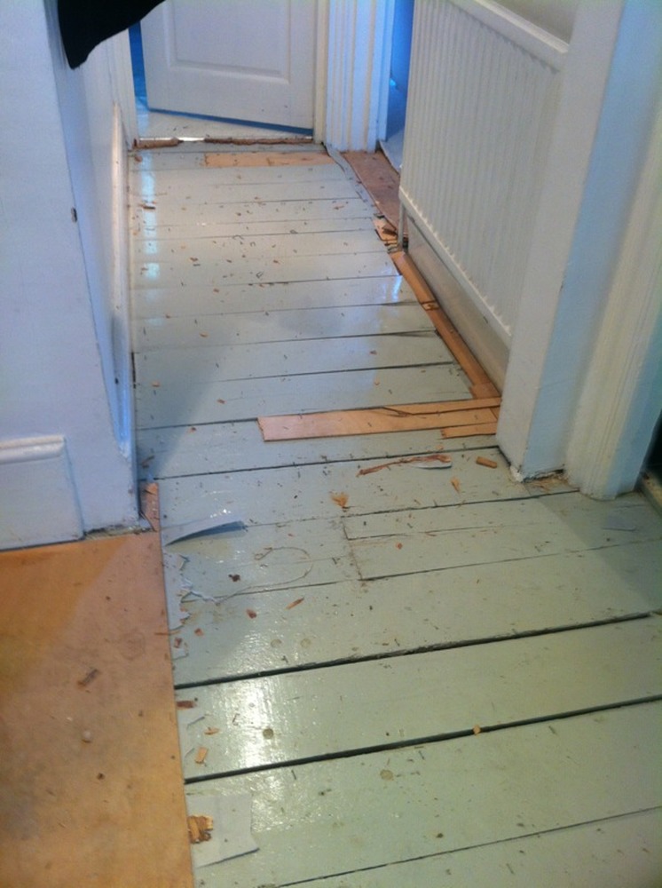 Level uneven floorboards Flooring job in Holloway, North London