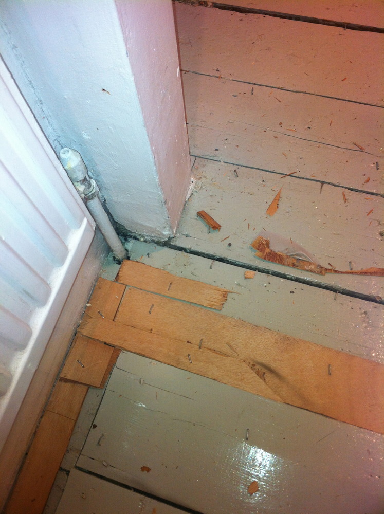 Level uneven floorboards Flooring job in Holloway, North London