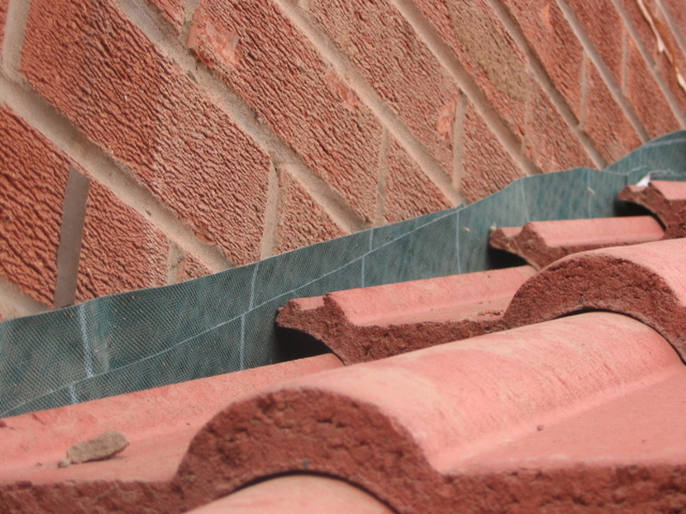 Cavity Tray, Lead Flashing, Ridge Tiling, Brick Work. Bricklaying job