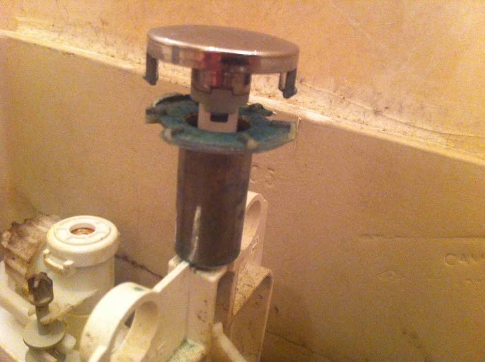 Replace toilet button flush Plumbing job in Paddington, West London
