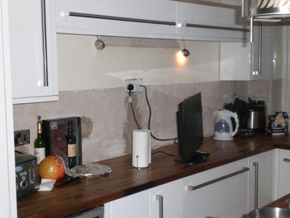 Kitchen Tiling under and window sill Tiling job in