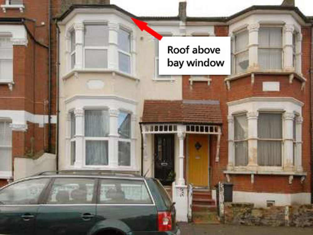 Replace felt on flat roof over bay window Roofing job in West Norwood
