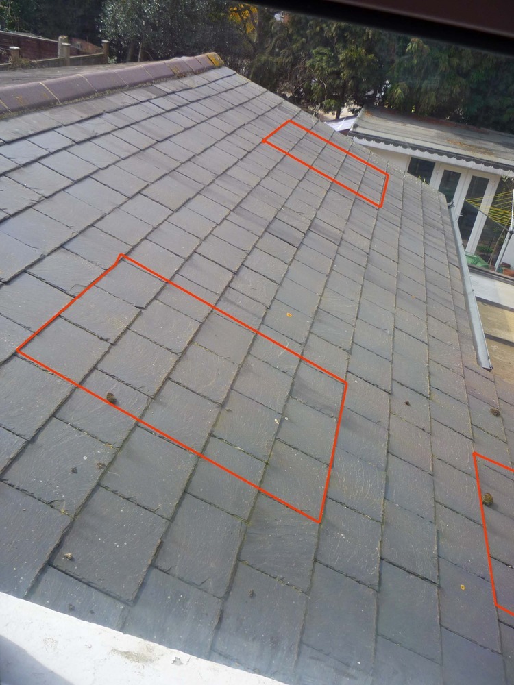 Velux window fitting on single story slate roof Windows job in