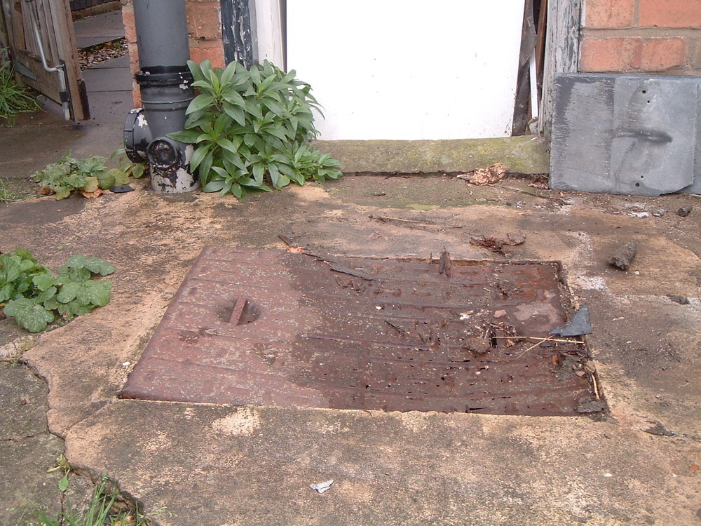 Patio, slabs and drain cover + garden Landscape Gardening job in
