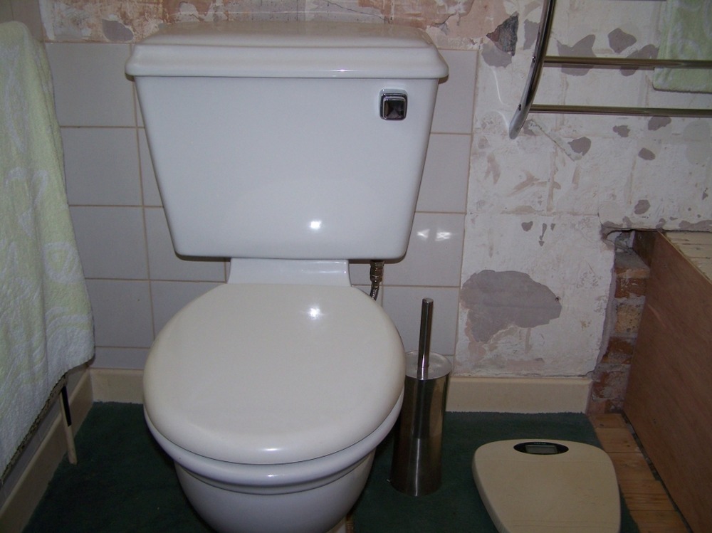 Move Toilet Sideways (Cast Iron Soil Pipe) Plumbing job in Wirral