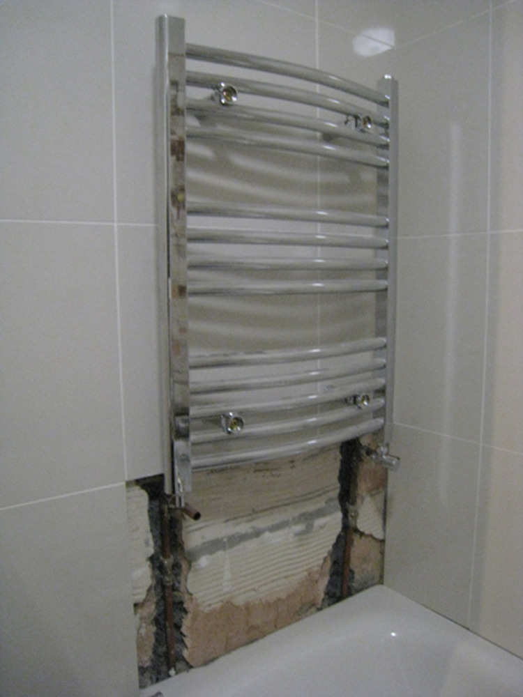 shower-fitting-towel-radiator-fitting-some-tiling-bathroom-fitting