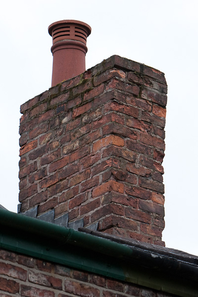 Reduce chimney stack, replace lead flashing, repoint Chimneys
