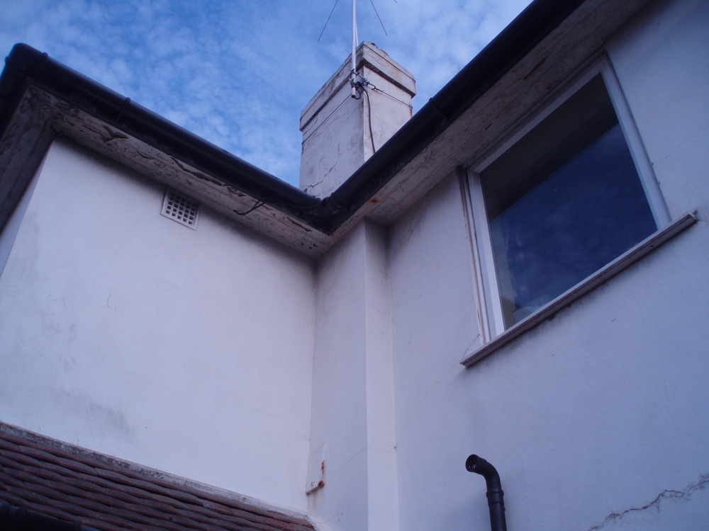 Fix source of damp at top of upstairs bedroom wall Damp Proofing job