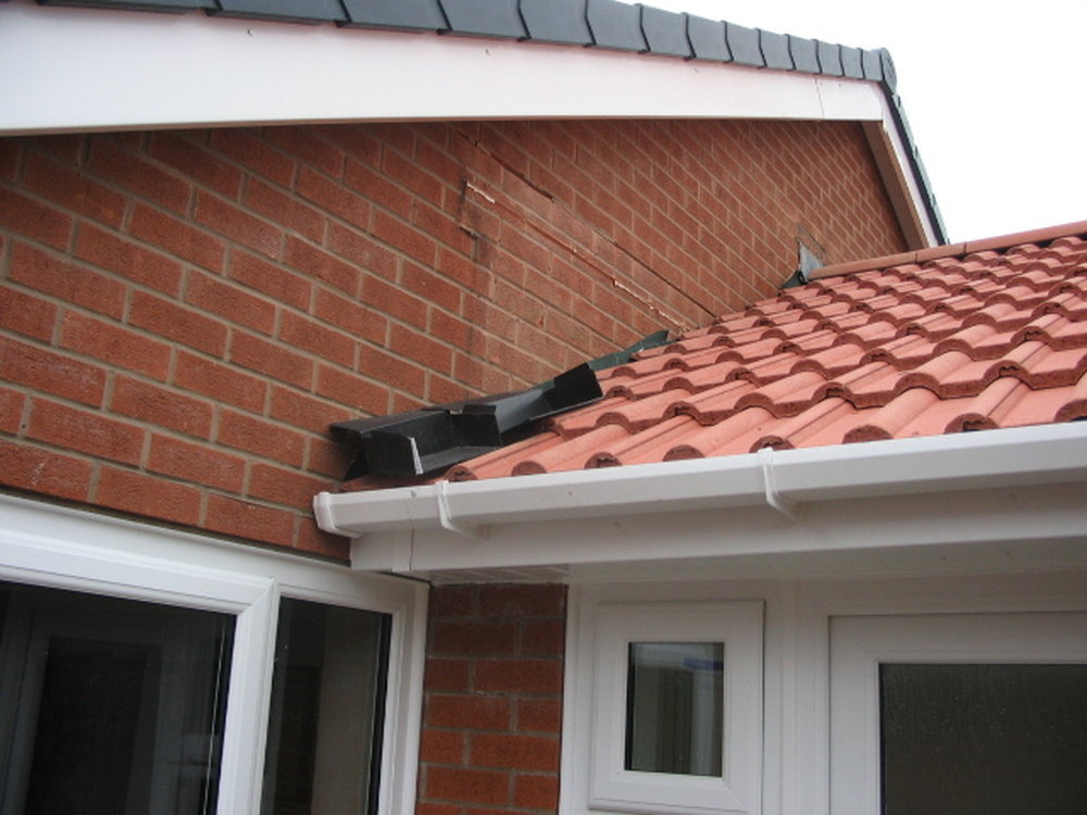 Stepped Cavity Tray /Lead Flashing To Wall Of Bungalow Bricklaying