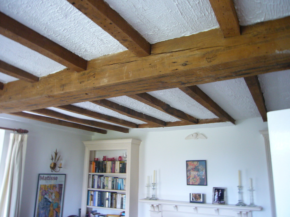 Plaster a ceiling between beams 14 by 14 Plastering job in Worcester