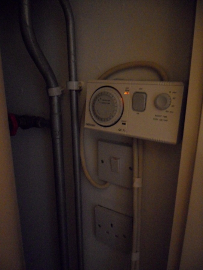 Installing Economy 7 hot water Timer Electrical job in Woolwich