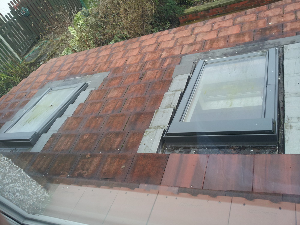 roof leak round 2 velux windows on shallow pitch roof Roofing job in Sheffield, South
