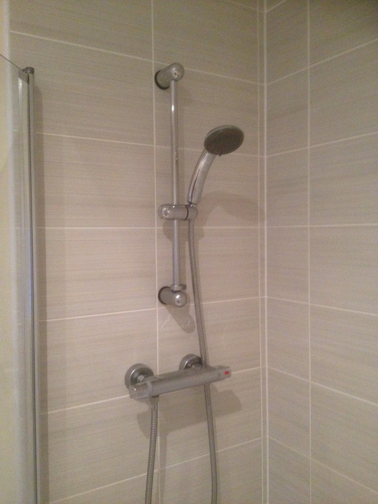 Fit thermostatic shower to existing bath & tiling Bathroom Fitting