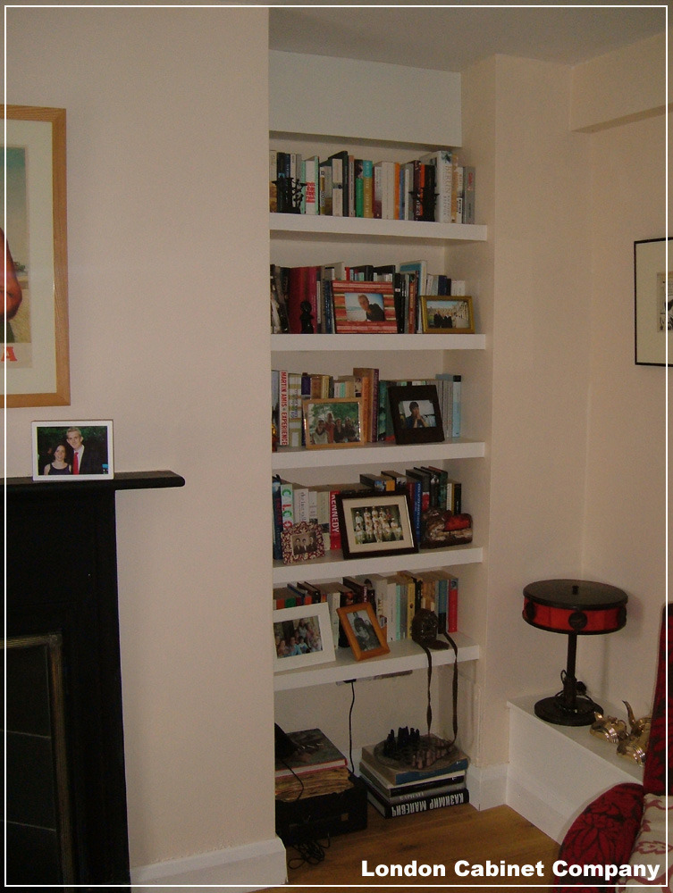 building book shelves into alcoves next to the chimney Carpentry