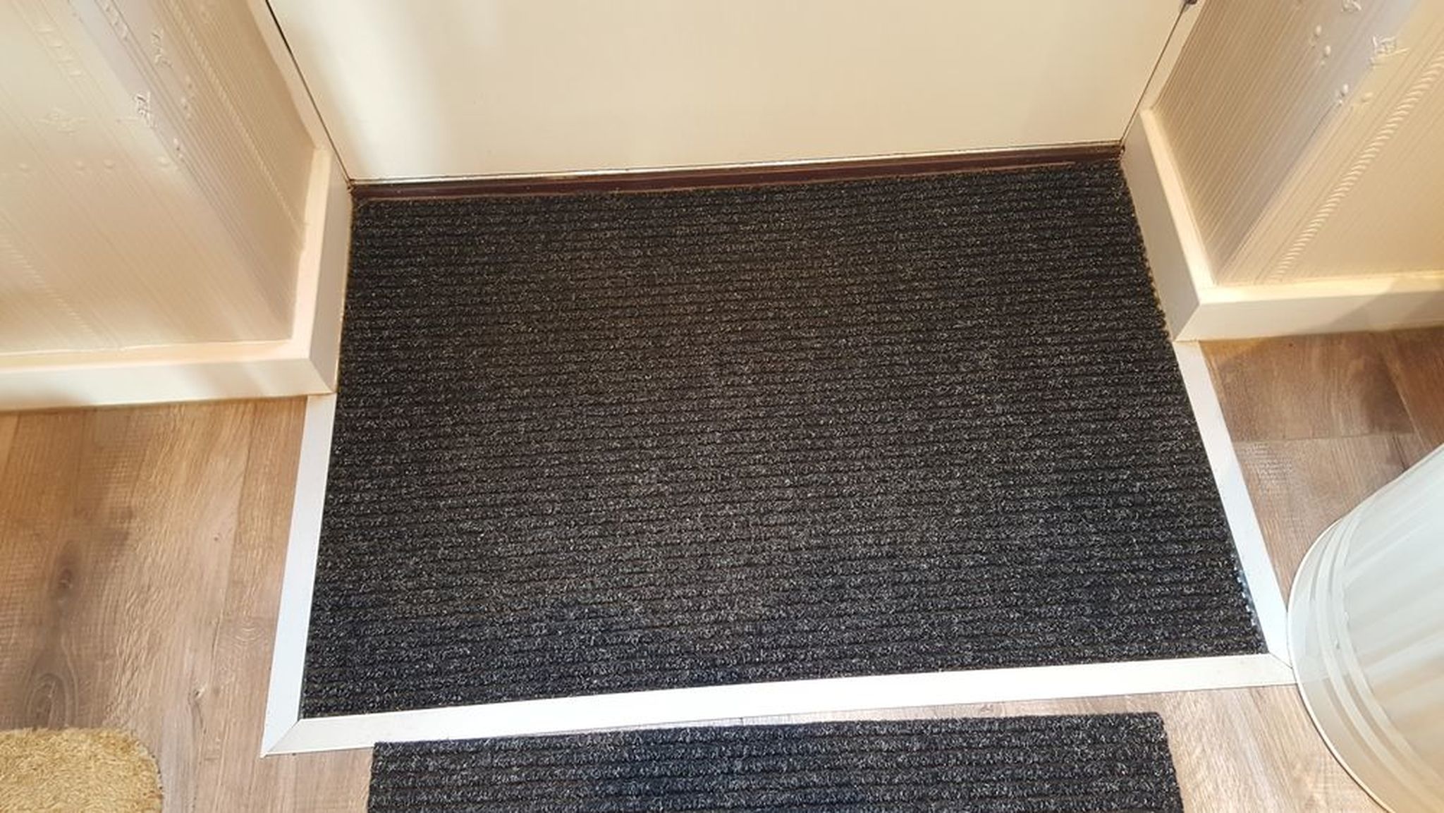 Door mat edging round laminate floor - Job of the Year ...